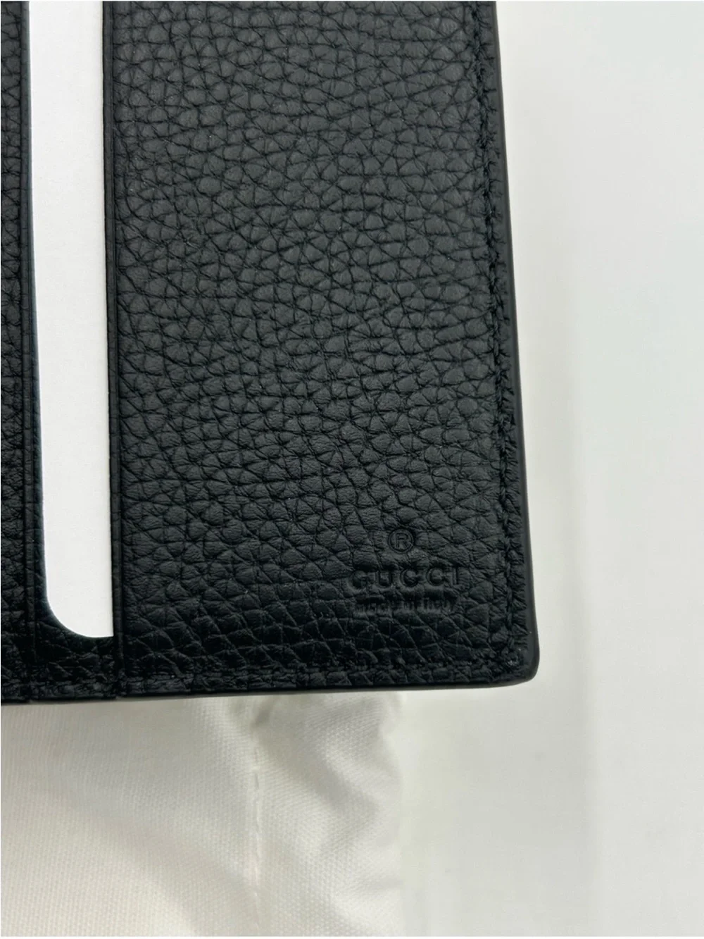 Gucci Black jumbo GG Leather Bifold Wallet.